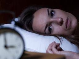Why do we sleep badly during the first night in a new place?